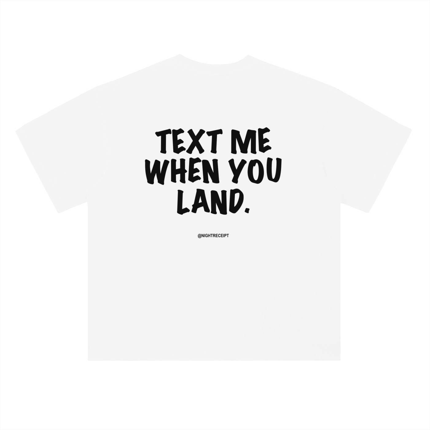 Back of the white heavyweight drop-shoulder tee with TEXT ME WHEN YOU LAND printed large in black marker lettering