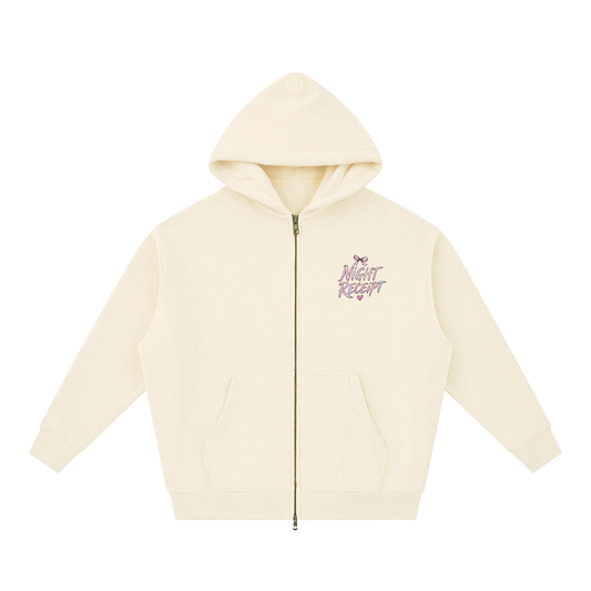 Front of the apricot oversized fleece zip hoodie with the hand-lettered NIGHT RECEIPT left-chest logo