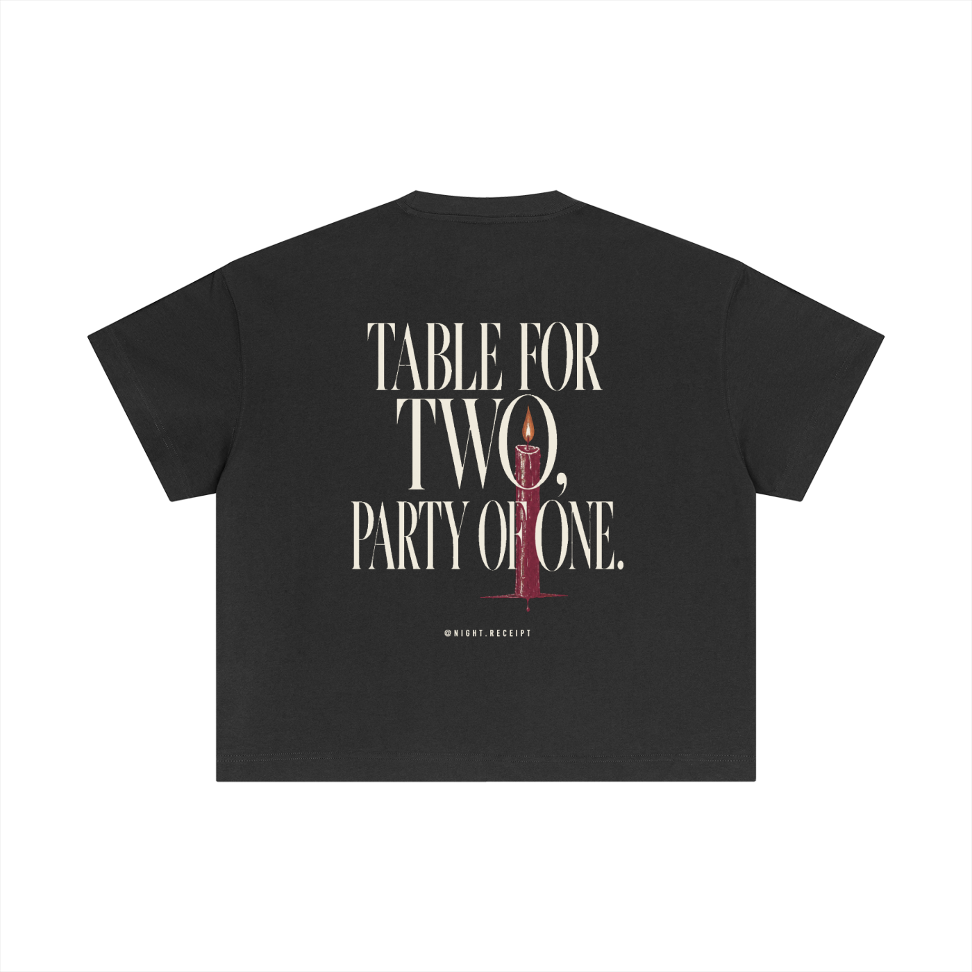 Back of the dark gray Night Receipt boxy cotton tee with TABLE FOR TWO, PARTY OF ONE in editorial serif capitals and a single lit oxblood taper candle threading the O of TWO and the O of ONE
