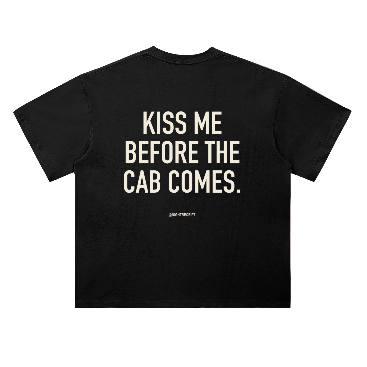 Back of the black heavyweight drop-shoulder tee with KISS ME BEFORE THE CAB COMES in cream condensed capitals